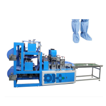 Disposable laminated boot cover machine